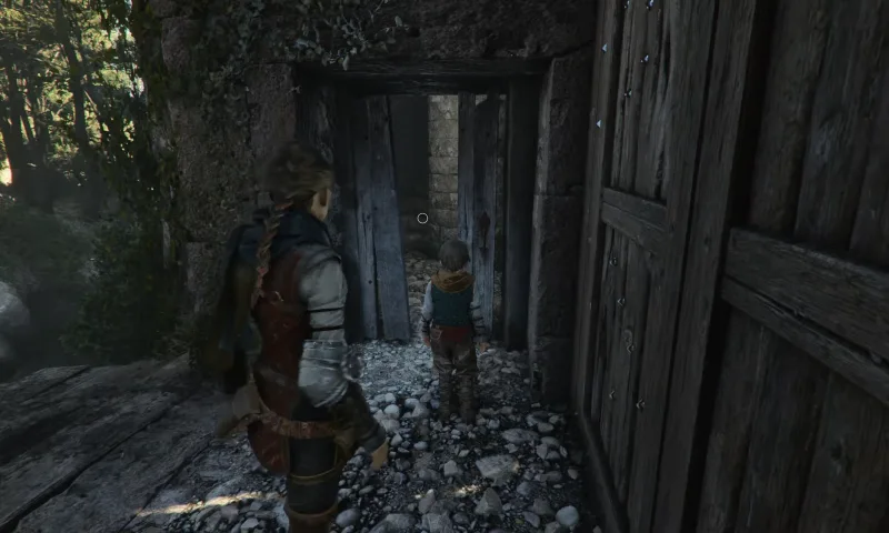 Entering castle by the narrow wooden entry.