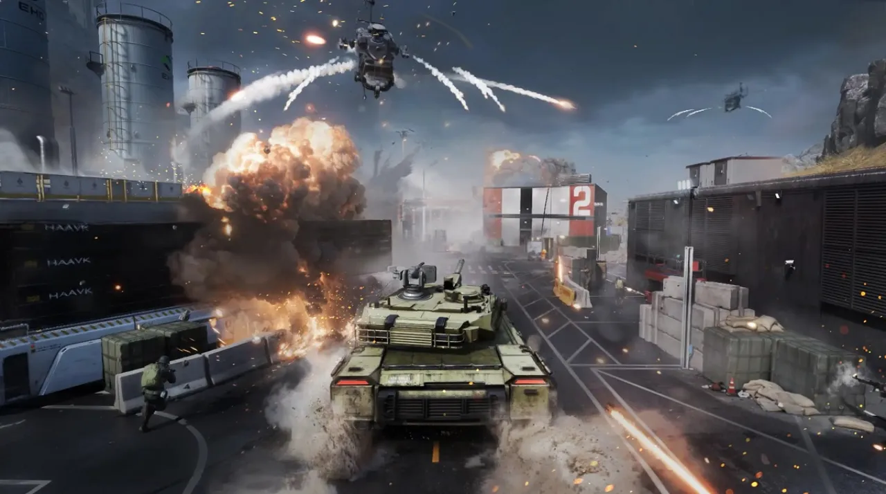 Delta Force war image including tank, helicopter and fire blasts here and there.