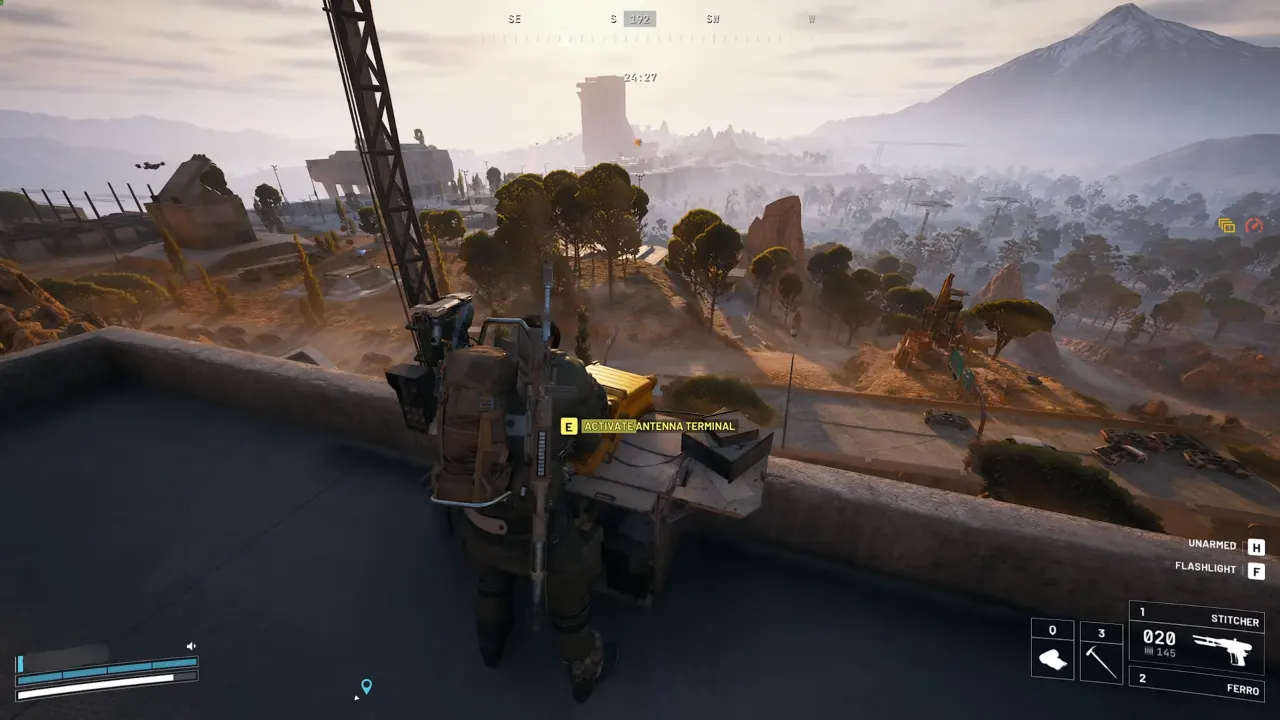 Raider interacting with terminal to activate antenna in ARC Raiders.