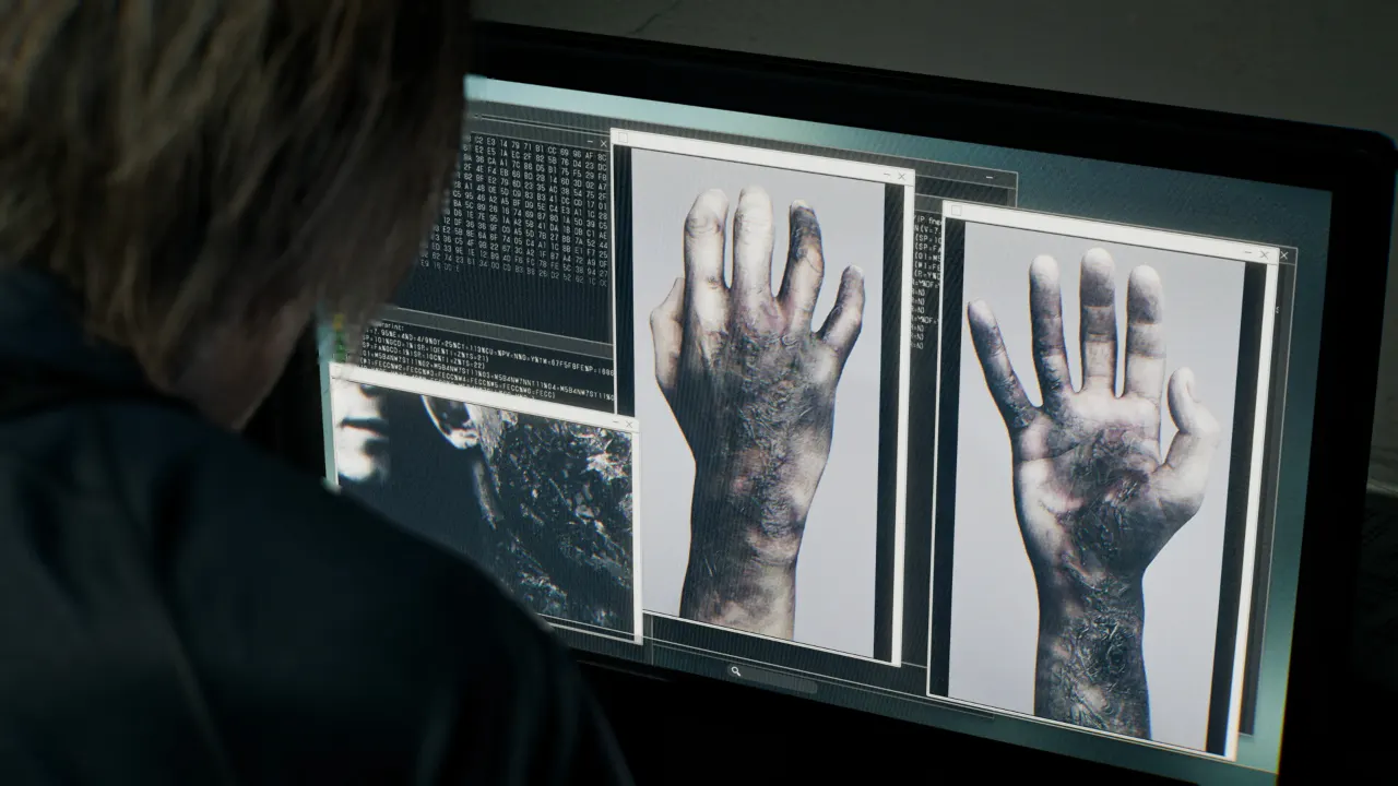 Image showing zombies hands on a computer screen in resident evil requiem