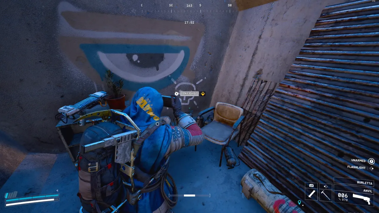 ARC Raiders Keeping an Eye Out - A player taking photo inside base.