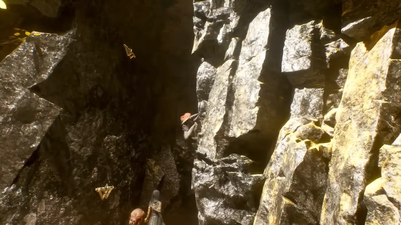 Climbing to the cliff top using handholds.