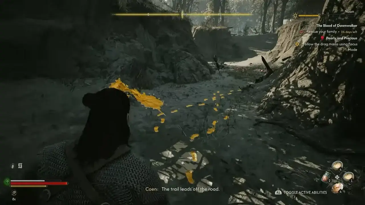 Coen following the footprints and drag marks using Focus Mode in The Blood of Dawnwalker.