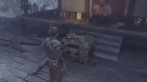 Musashi opening a gold Oni Armament chest in Onimusha Way of the Sword