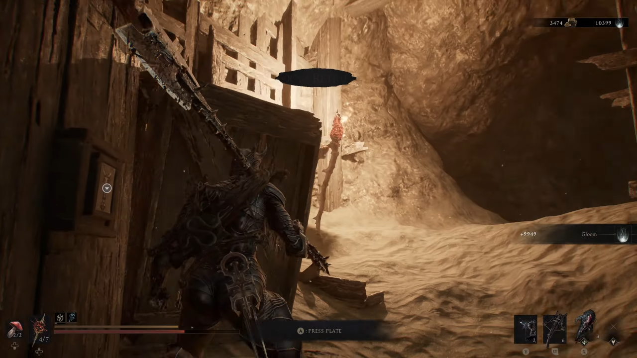 Hidden wall switch to lift open the iron gate to access the reward chest
