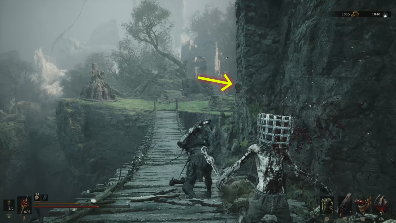 cross the wooden bridges toward Flooded Village